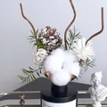 Black aroma diffuser with white dried flowers, pine cone and cotton for home decor - Kunlun Snow