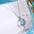 Silver crescent moon pendant necklace with blue zircon and teardrop gemstone, 28.5mm height - Silver/Light Blue