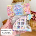 Weiches Waffel-Quetschspielzeug mit bunten Streuseln in 8x8x3,5cm Verpackung - Dreieckige Lila Rosa Weiß Waffel