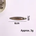 Pince à cheveux Y2K en métal argenté pour femmes avec finition polie de 6 cm - Pince Bec de Canard Ovale Ajourée (X1-450) / 6cm
