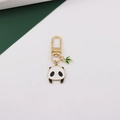 Detail of cute panda keychain with golden lobster clasp and green enamel bamboo leaf - Panda Head and Bamboo
