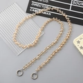 Detail van champagne kristallen kralenband met zilveren veerringen voor tassen - Goudgeel (K2982)