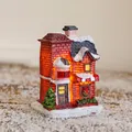 Miniatur-Geschenkladen aus rotem Backstein mit warmem LED-Licht und Schneedetails - Typ B (Geschenkladen)