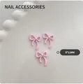 Three pink matte resin bow charms for nail art DIY in size 8x11mm on ceramic plate - Large-Light Pink