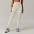 Leggings da yoga a vita alta bianco crema con tasche laterali e tessuto traspirante - S / Albicocca Crema