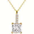 Close-up of gold-plated pendant featuring a princess-cut diamond and four small round stones - Gold Tone Square Stone
