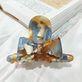 Elegant marble pattern acetate hair claw clip with blue and orange bow design - Blue Brown Marble