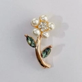 Elegant gold flower brooch with white pearls, crystal center and olive green leaves - White Pearl Flower