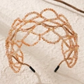 Handmade orange-pink crystal beaded hairband with intricate woven mesh for bridal style - Champagne