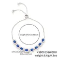 Elegant gold plated silver pull-bracelet with oval blue halo stones and zircon details - Blue