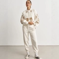 White tracksuit set for women with long sleeve sweatshirt and matching joggers set - S / White