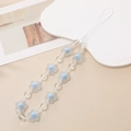 Handmade beaded phone strap featuring clear round beads and frosted blue flower charms - K1178 Matte Flower Phone Chain Blue