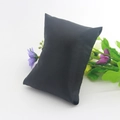 Soft black satin watch display pillow for jewelry presentation on a white background - Black Lining Fabric 8.5x8.5
