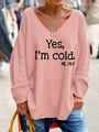 Detail of pink V-neck sweater with Yes I'm cold ME 24:7 text and soft knit texture - S / Pink