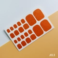 Glitter orange toe nail polish stickers with sparkling texture on white backing sheet - J013 Orange Glitter