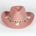 Pink woven straw cowboy hat featuring bohemian shell decorations and tassel band details - Pink