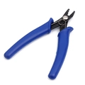 Close-up of precision blue handle wire cutters with spring-loaded mechanism and black metal blades - Crimping Pliers
