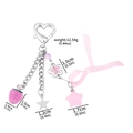 Pink strawberry keychain with heart clasp, ribbon bow, and star charms with measurements - BG00077 Pink Multi-Charm Keychain (Silver)