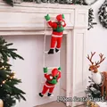 Detail of 40cm Santa Claus figures climbing a soft white ladder by a festive fireplace - 40cm 2 People Ladder