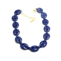 Macro detail of glossy dark blue coffee bean link chain with a golden lobster clasp - Dark Blue