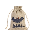 Halloween burlap drawstring bag featuring a black bat and graveyard silhouette design - Bat