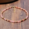 Pink natural stone disc necklace with gold spacers and adjustable lobster clasp - Strawberry Quartz