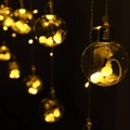 Warm white LED wishing ball string light with transparent globe for Christmas decor - 12 Balls - 8 Modes / Warm White