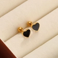 Gold heart earrings with black inlay and screw back displayed in a jewelry box - Black Heart / Gold/Black
