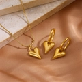 Polished gold heart pendant necklace and earrings set on champagne satin and stone - Gold Necklace + Ear Buckle Set (B308-B310)