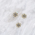Golden snowflake nail charm with sparkling rhinestones on white glitter nail art design - Style A1143-16