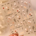Selbstklebende Nagelaufkleber mit weißen Rosen und goldenen Schleifen-Motiven - M-631