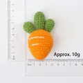 Handmade knitted carrot keychain charm with 7.5cm measurement on white background - Combed Cotton Knitted Carrot