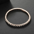 Elegant rose gold tennis bracelet featuring a single row of sparkling cubic zirconia stones - Single Row Rose Gold