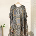 Detail of a lightweight paisley print kimono wrap featuring elegant tassel hem detailing - One Size / Persian Style
