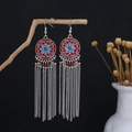Close-up of bohemian tassel earrings with tribal enamel patterns and colorful beads - Red Blue Colorful Beaded Long Tassel Style (E6140-3)