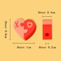 Perline a cuore in argilla polimerica rosa e rossa con lettere XO per gioielli - Cuore Diviso XO