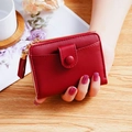 Deep red short wallet in faux leather with gold zipper and stylish tassel detail - Red