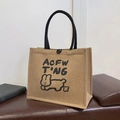 Brown linen tote bag with black rabbit print and woven handles for casual commute - Rabbit
