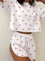 Detail of white cherry print pajama set showing short top and drawstring shorts - S / White Cherry
