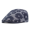 Close-up of daisy jacquard denim fabric texture and pattern on a stylish newsboy cap - Navy Blue