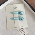 Juego de dos pinzas para el cabello con forma de estrella azul claro para niñas en tarjeta - Clip Azul Lago Con Estrella Metálica (5778927155319) / Azul lago