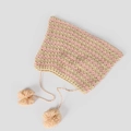 Detailed macro view of pink and yellow striped knit elf hat with ears and pom-poms - Pink