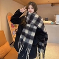 Plaid tassel scarf in black and white large checks worn with a winter coat - Black Two-Tone