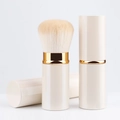 Portable cream-colored retractable foundation brush with golden ring and soft bristles - Large White Round Head