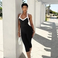 Detail of black ribbed jumpsuit with U-neck white trim piping on the neckline - XS / Black
