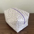 Chic floral makeup bag with purple flower pattern and sturdy zipper for travel storage - Purple