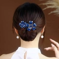 Pince à cheveux fleur bleue élégante avec cristaux de zircon sur base en métal doré - Fleur en Cristal Bleu