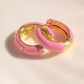 Pink enamel hoop earrings with magenta floral pattern and gold plated finish - Pink