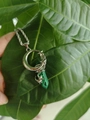 Malachite stone hexagonal pendant with silver moon and star wire-wrapped design - Malachite / Silver Chain