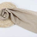 Beige chiffon hijab scarf with pearls on rustic straw mat with elegant soft folds - 132